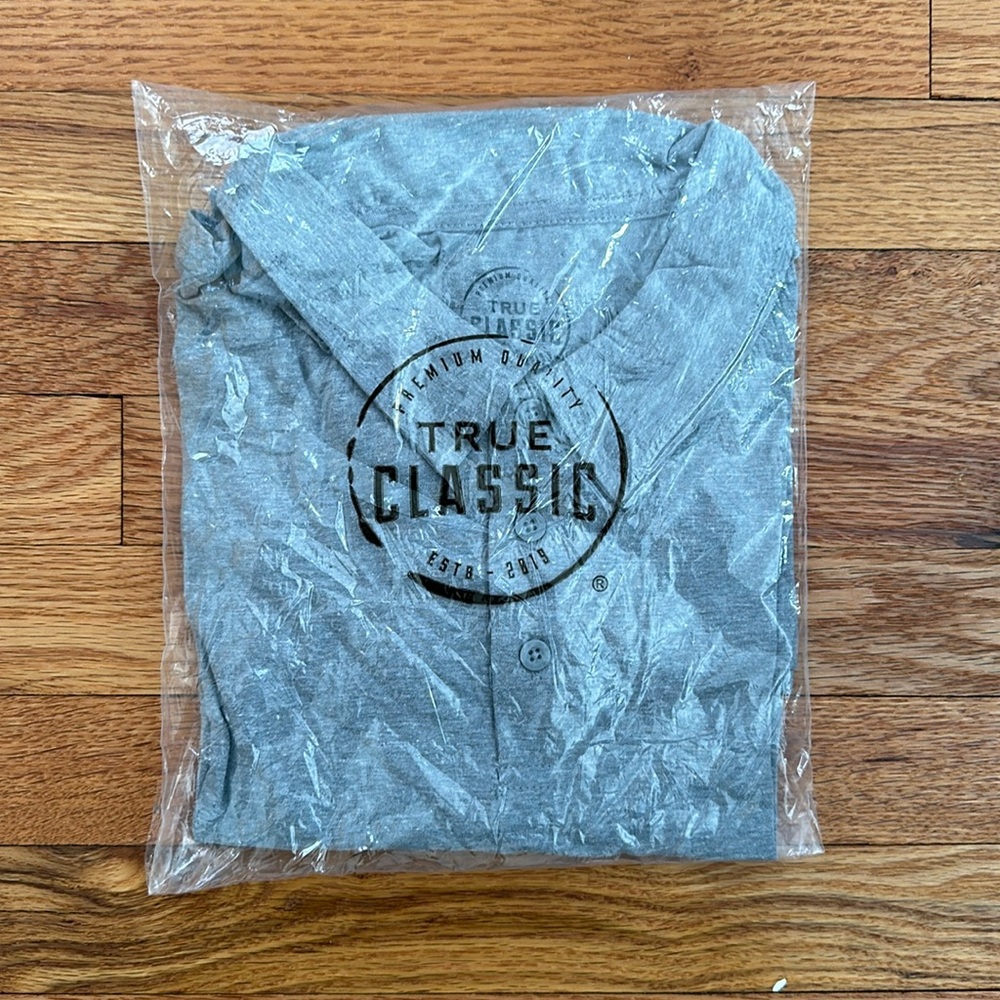 Never opened true classic T short sleeve polo